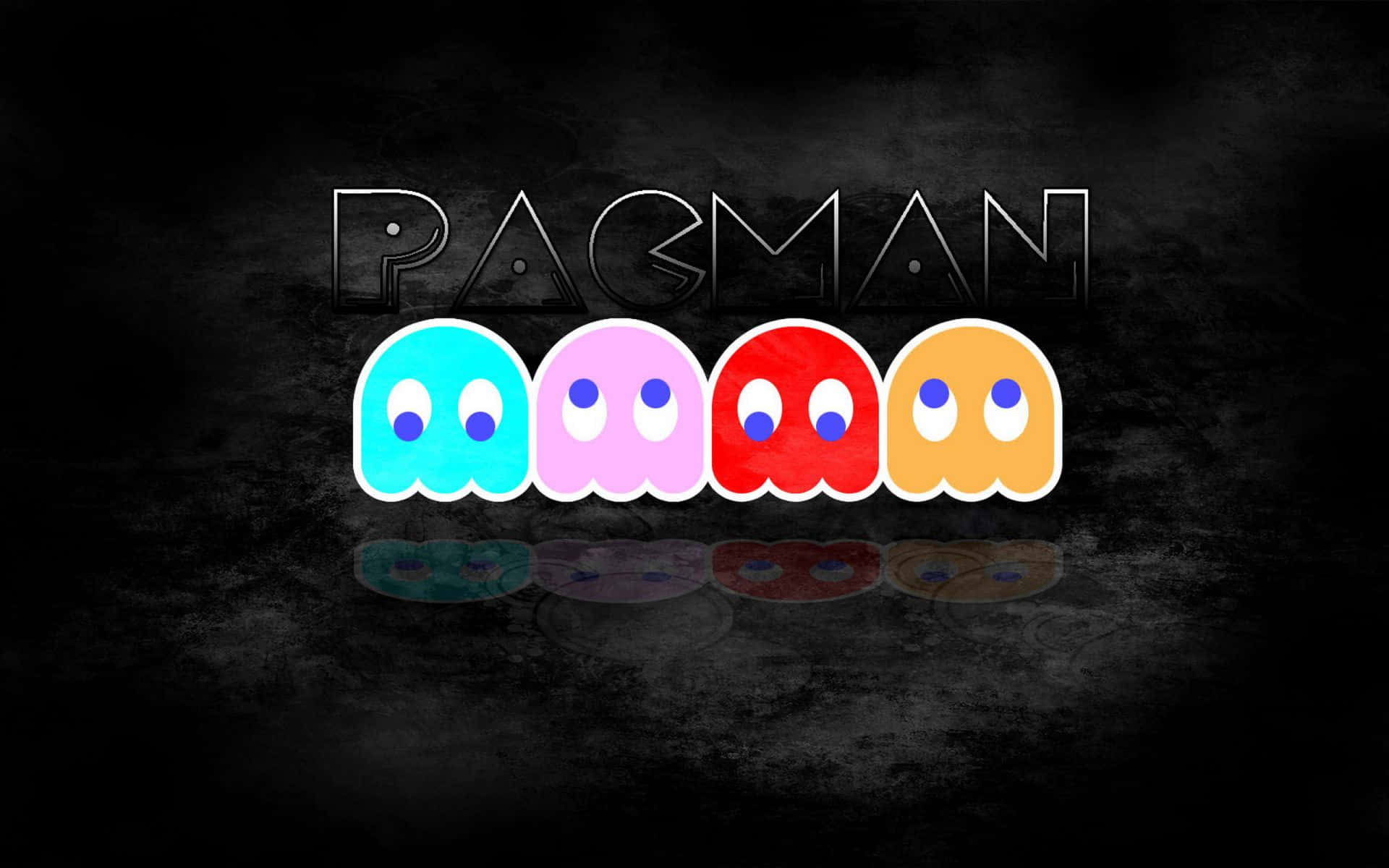 四個 Pac-Man 鬼魂，分別為青色、粉紅色、紅色和橙色，上方有 Pac-Man 標誌。