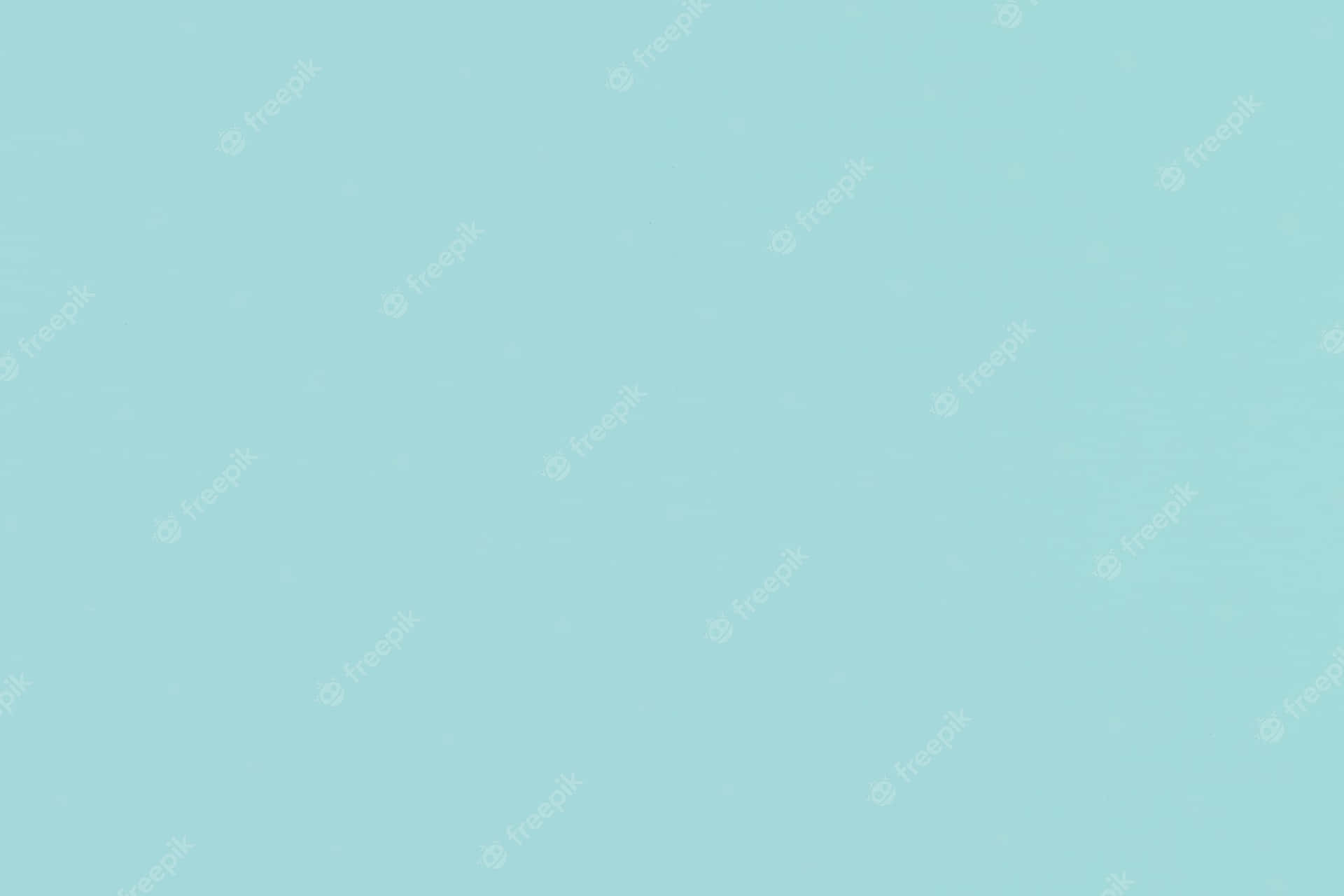 柔和藍色紋理牆紙，帶有輕柔的水波紋效果。