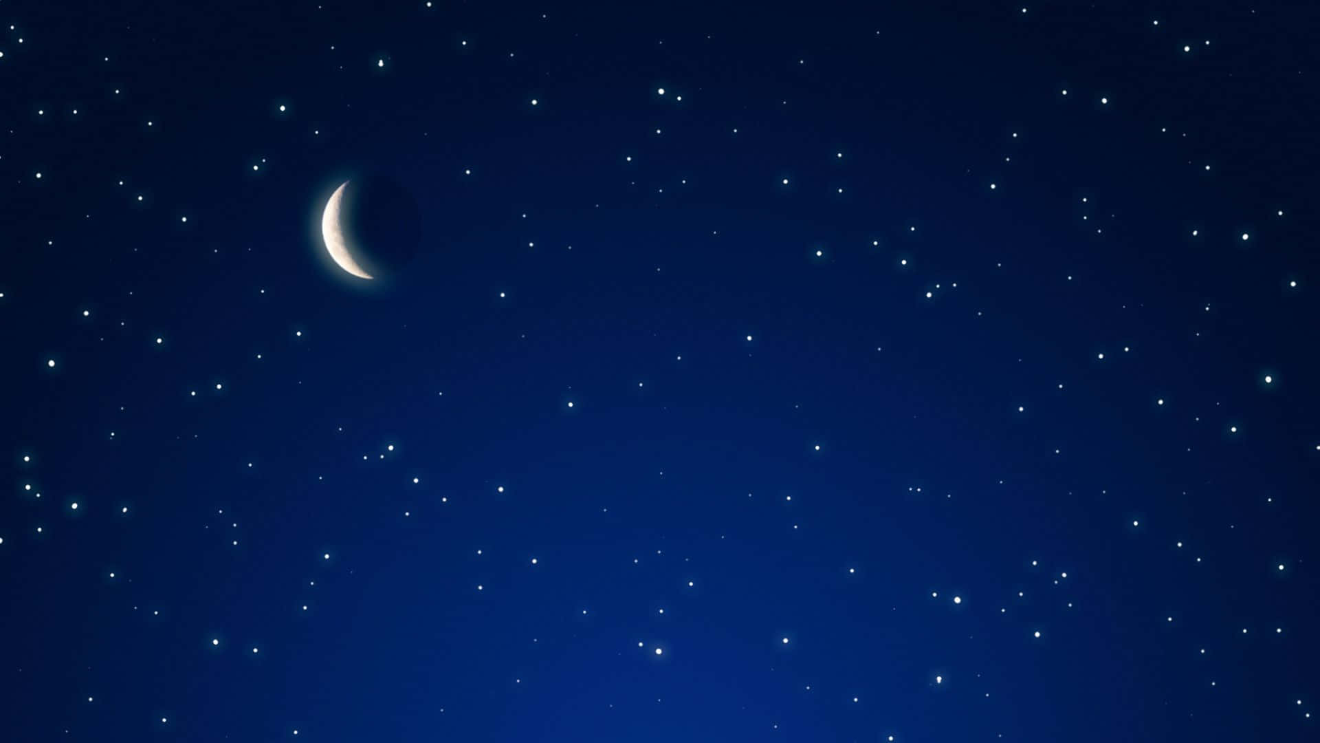 深藍色夜空中的新月和星星