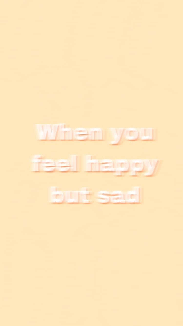 文字壁紙，在蜜桃色背景上顯示「When you feel happy but sad」。