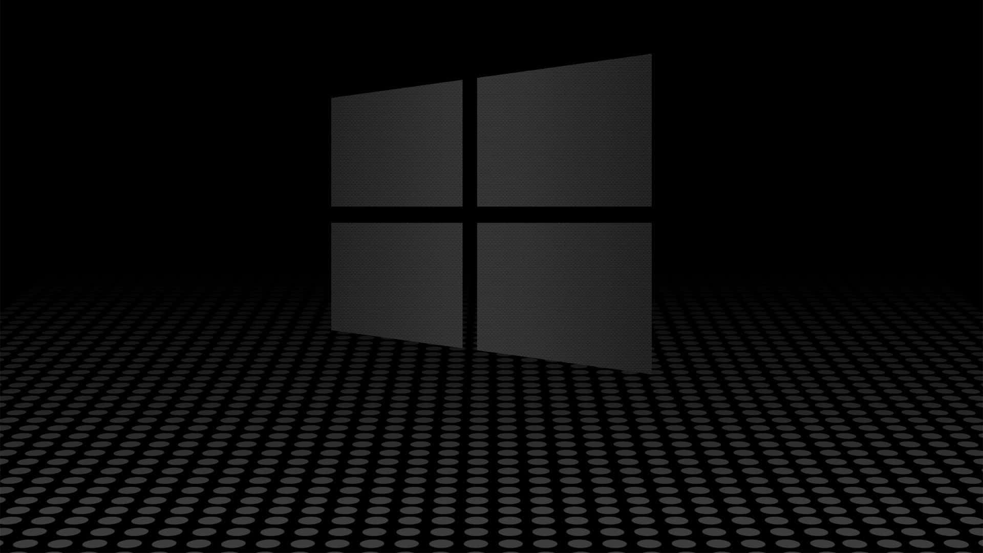 黑暗空間中穿孔地板上的Windows標誌