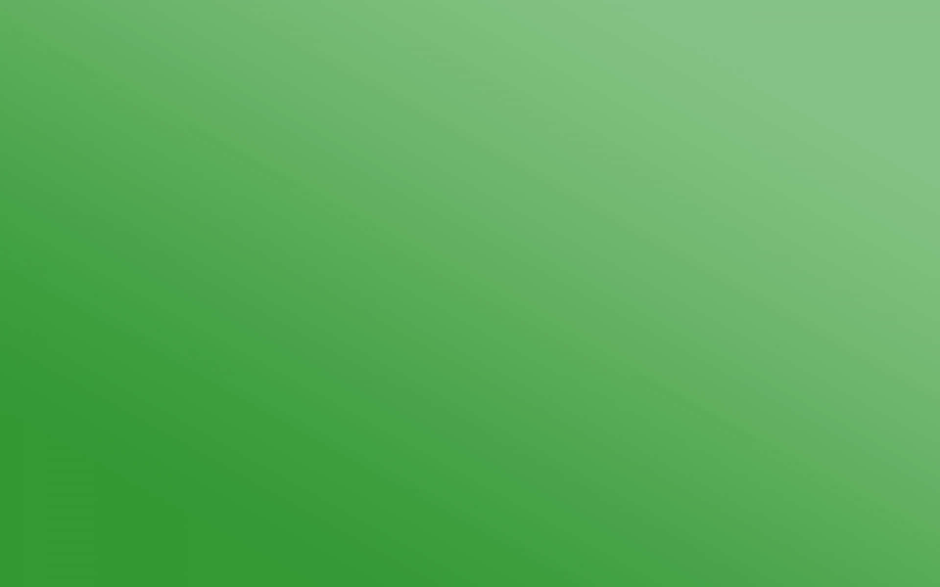 Green Gradient 桌布 壁紙 — 整個畫面中從深綠到淺綠的平滑漸變。