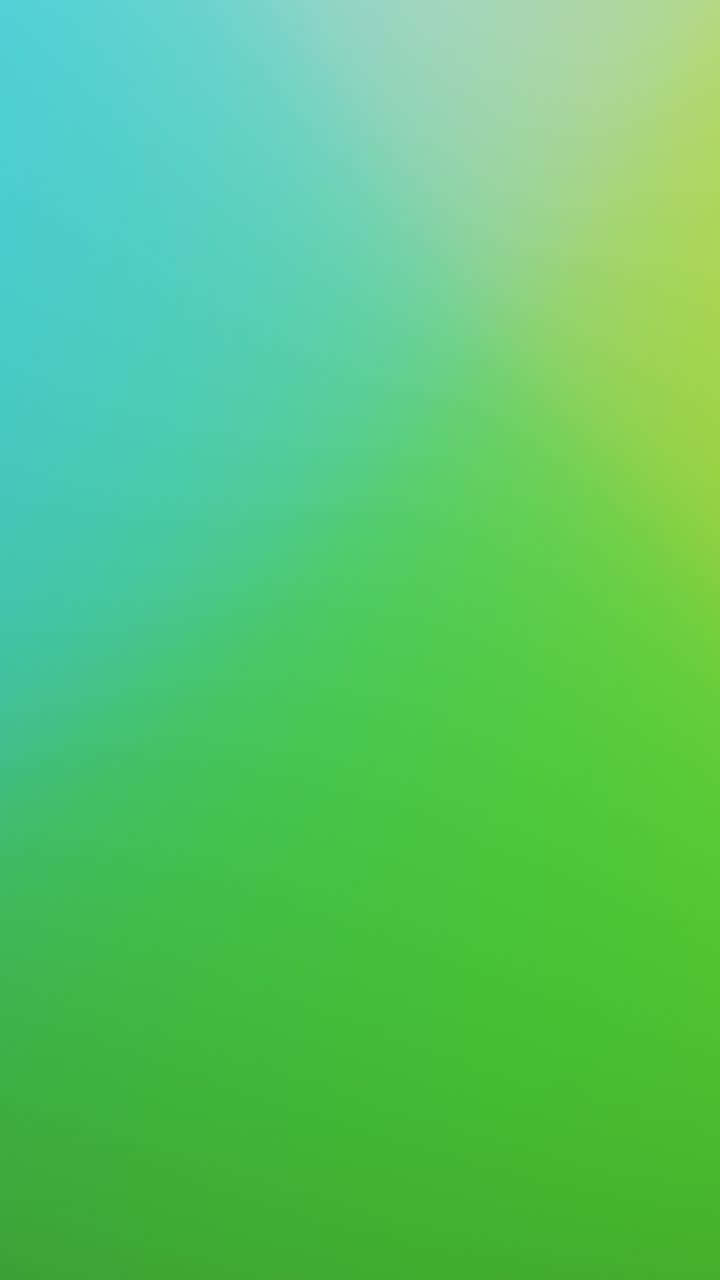 Green Gradient 桌布 壁紙 — 整個畫面呈現由冷調青綠色到充滿活力的青檸綠的平滑漸變。