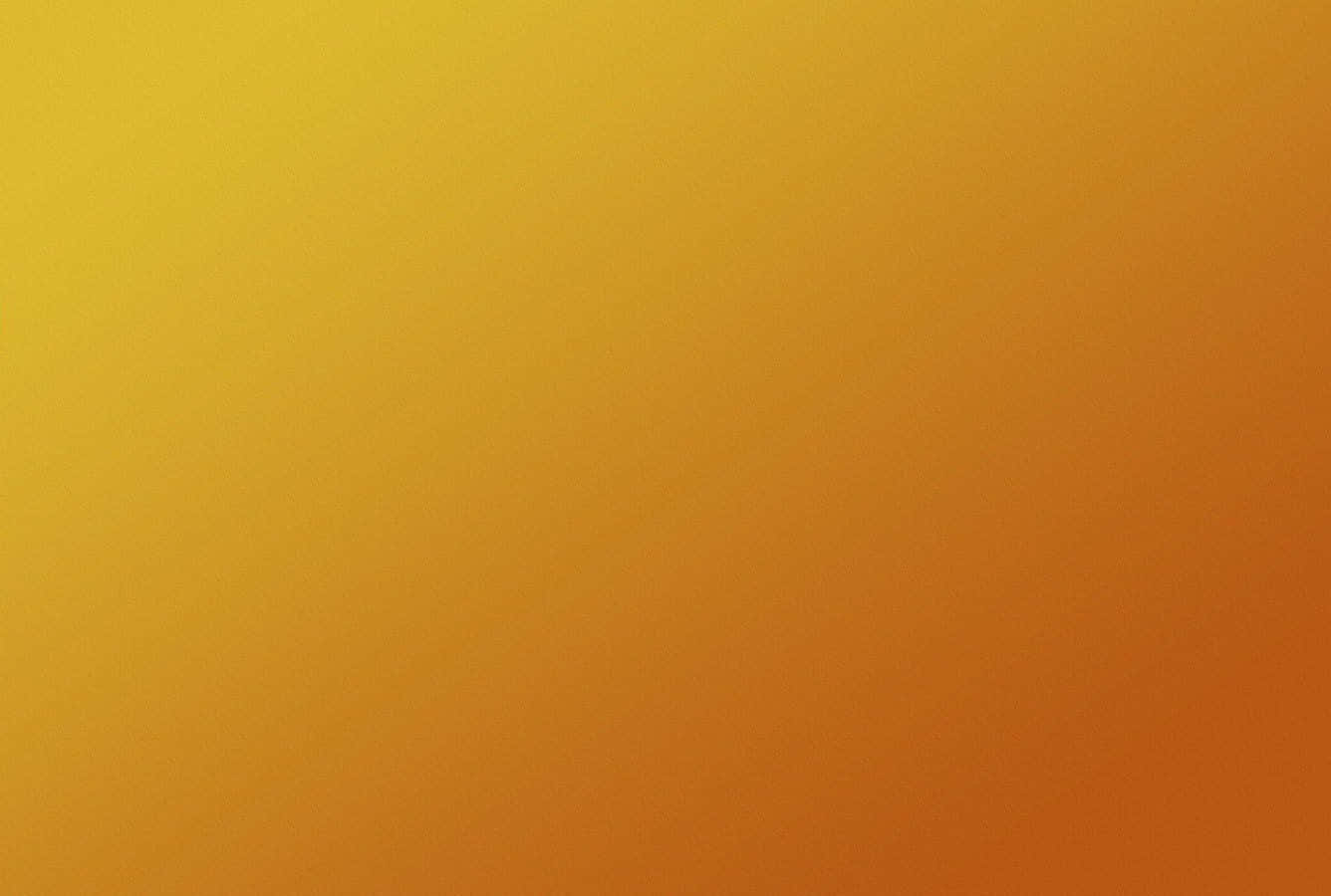 Yellow Gradient 桌布 壁紙 — 整個畫面由亮黃色到深橙色平滑漸變。