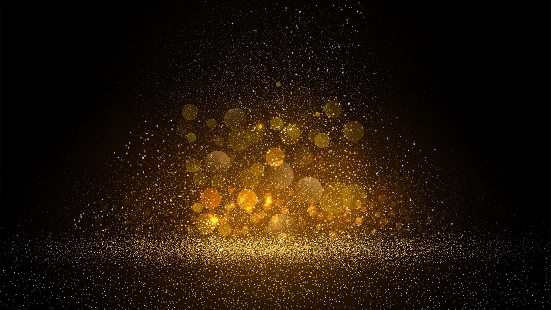金色閃粉粒子在深色背景上爆裂並散開。