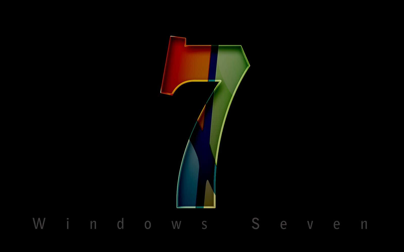數字7 還原風 Windows 設計 壁紙 — 一個光澤多彩的數字七標誌在黑色背景上發光，下方有「Windows Seven」文字。