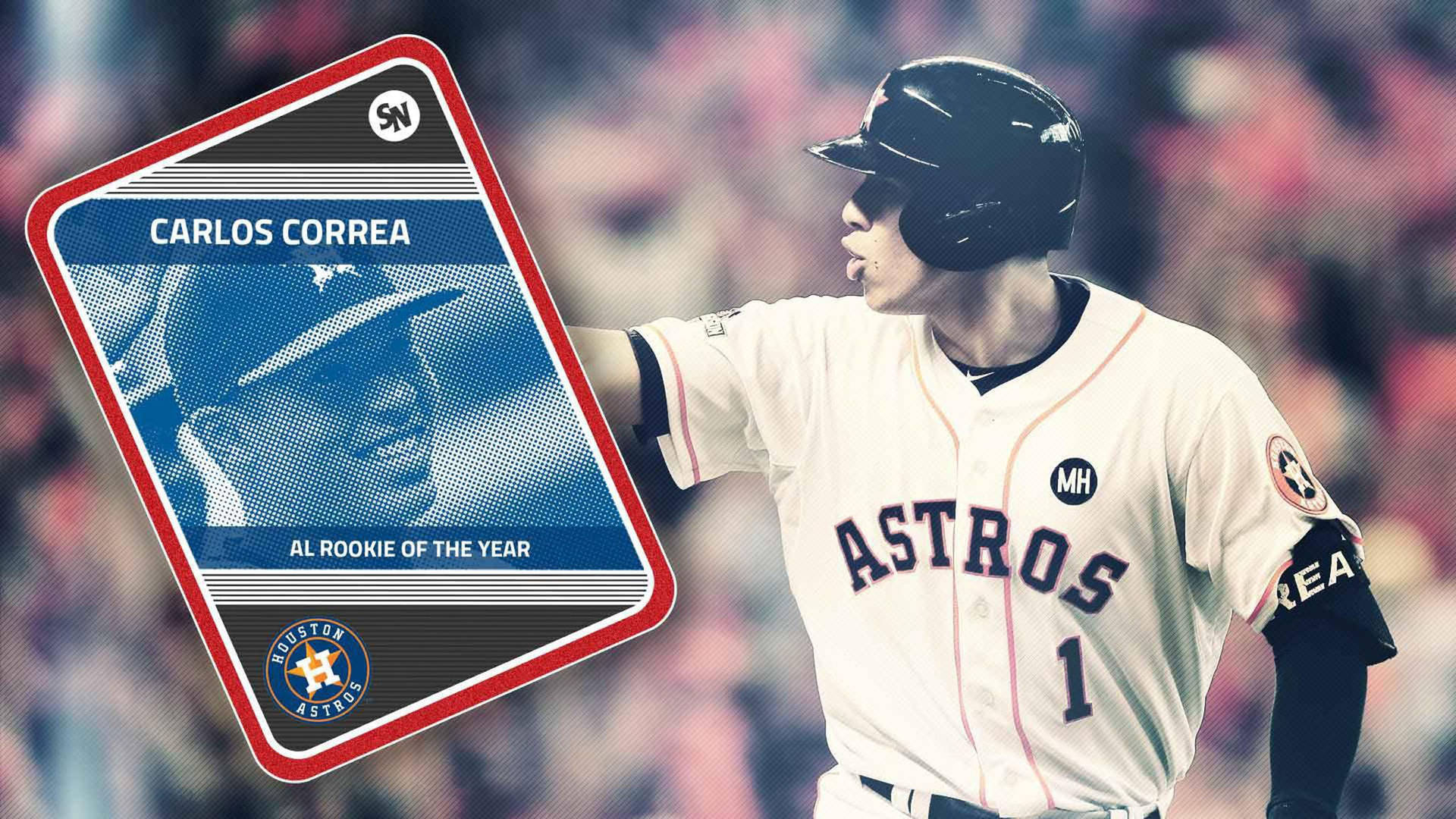棒球選手 Carlos Correa 舉起一張年度最佳新秀卡片圖形。