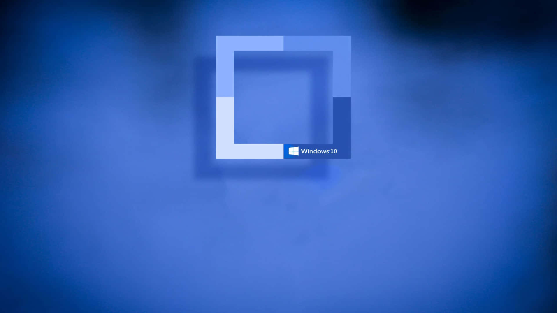 Windows 10 標誌在藍色漸變背景上，帶柔和陰影