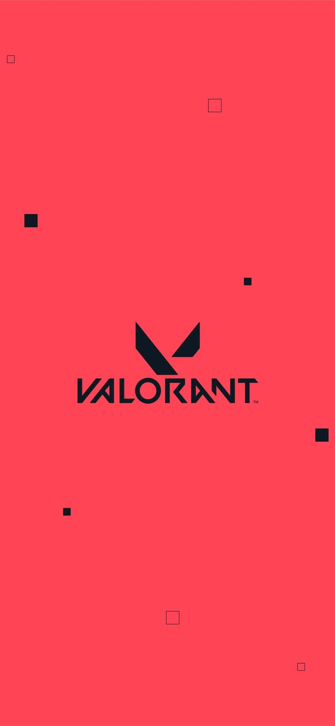 於 iPhone X 體驗《Valorant》 壁紙 — 一個大膽的黑色Valorant標誌置於鮮豔的珊瑚色背景中央，並散落著極簡的方形裝飾。