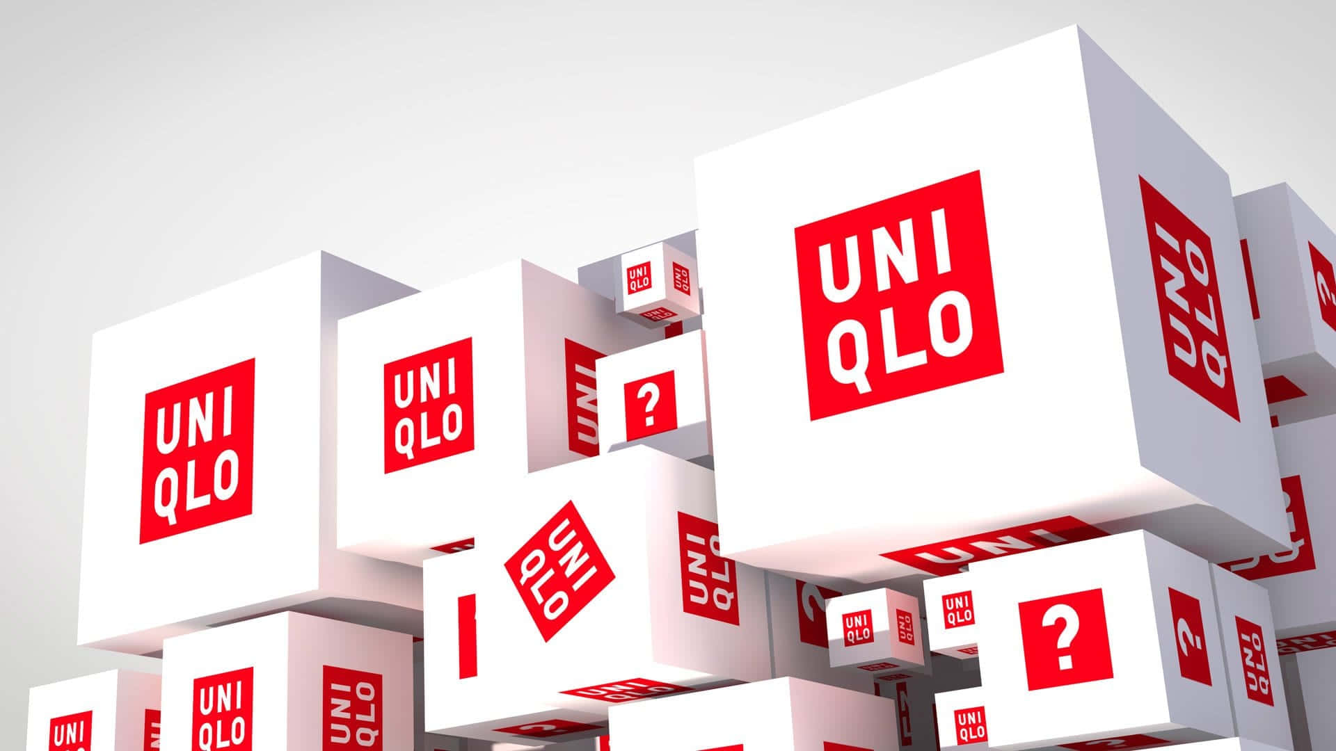 漂浮的白色立方體，帶有UNIQLO標誌和問號。