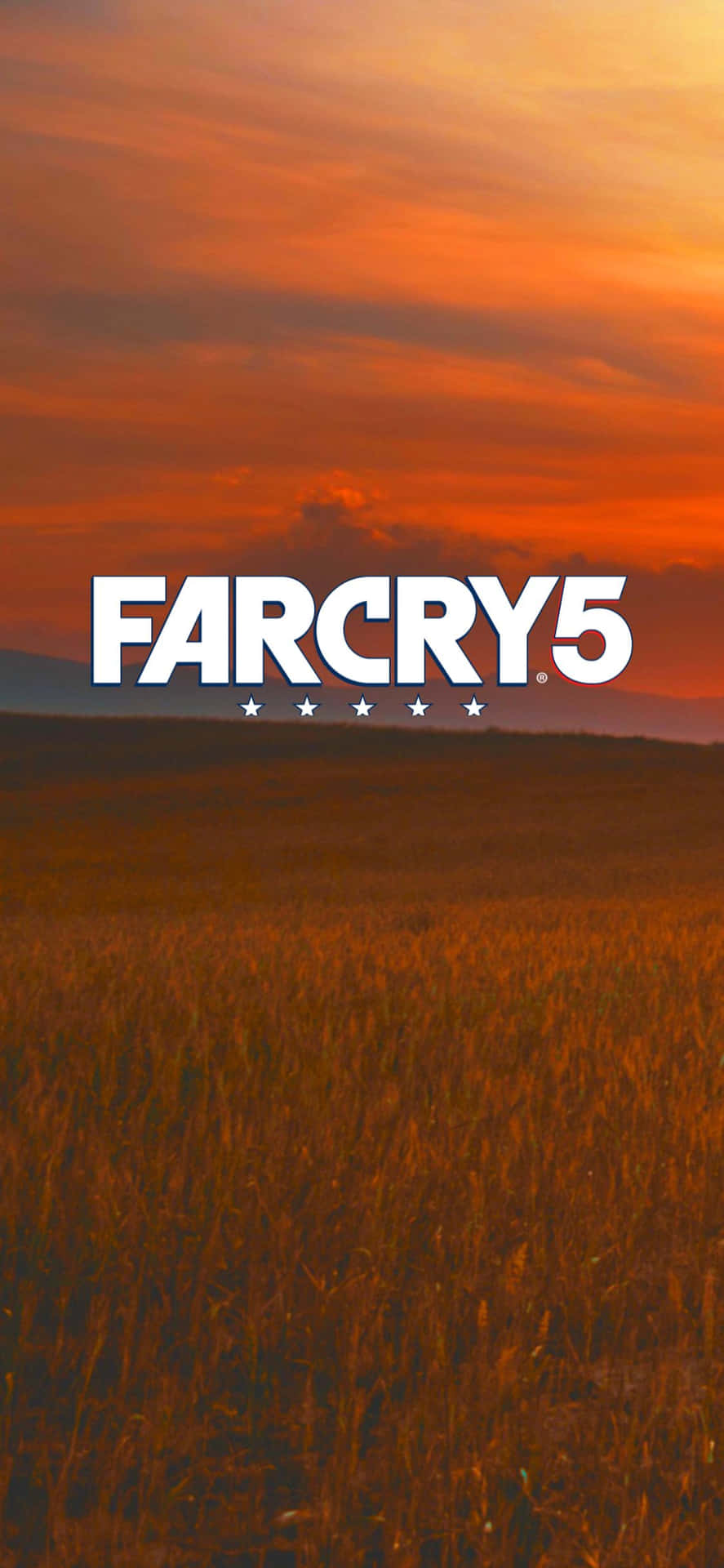 夕陽下的金色麥田，中央有 Far Cry 5 標誌。
