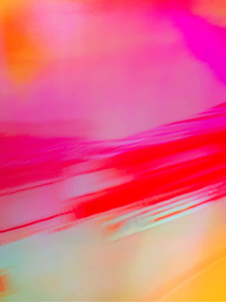 帶有流動粉紅色、紅色和橙色筆觸的抽象藝術作品。