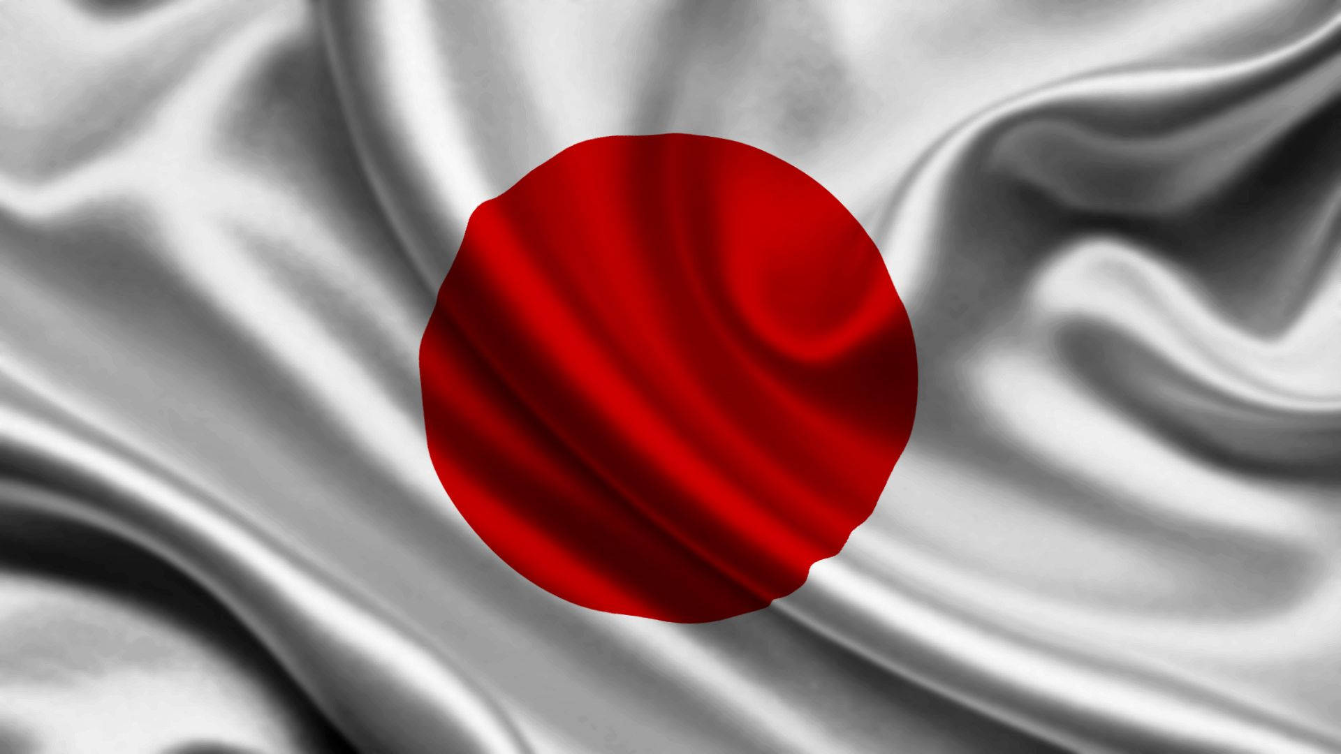 日本國旗灰布背景 壁紙 — 日本國旗的特寫，鮮紅色的圓圈位於飄逸的白色絲綢背景中央。