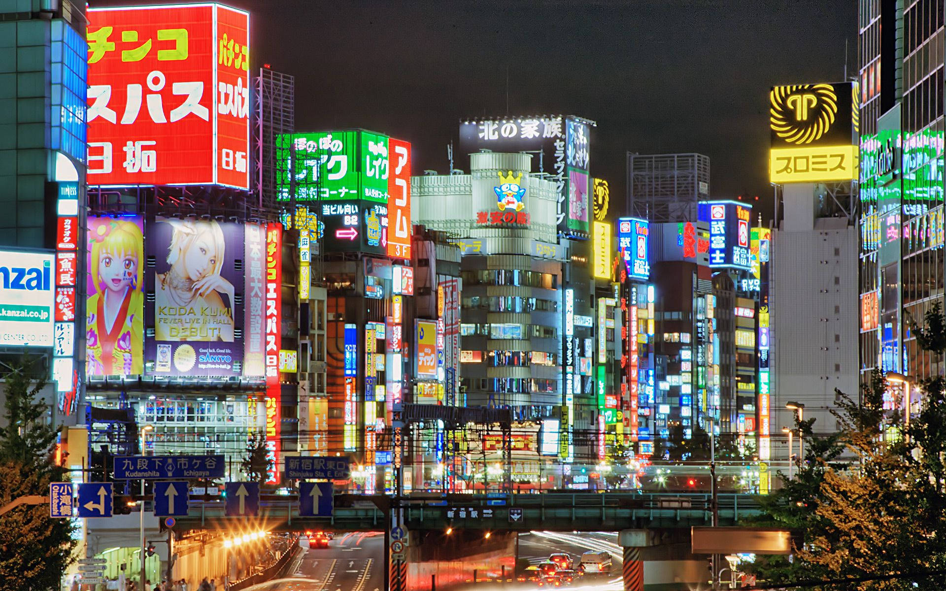 東京充滿活力的霓虹燈城市夜景，閃爍的廣告牌和繁忙的街道。