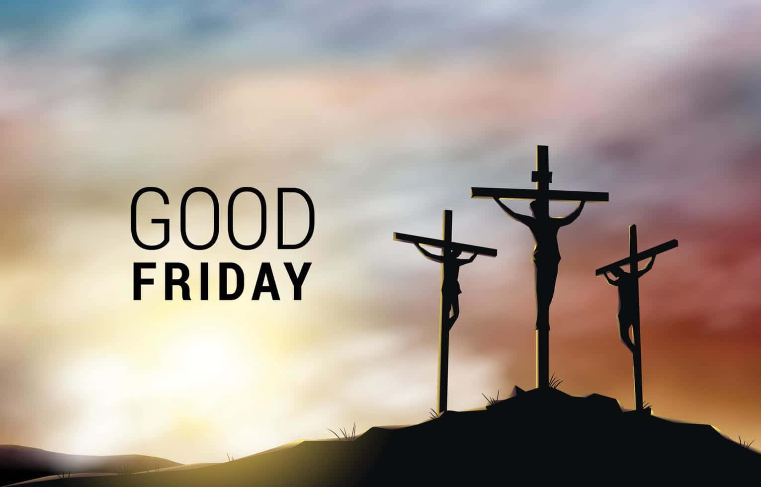 Friday 桌布 壁紙 — 日落時分山丘上的十字架剪影，配上 'GOOD FRIDAY' 文字，背景為溫暖多雲的天空。