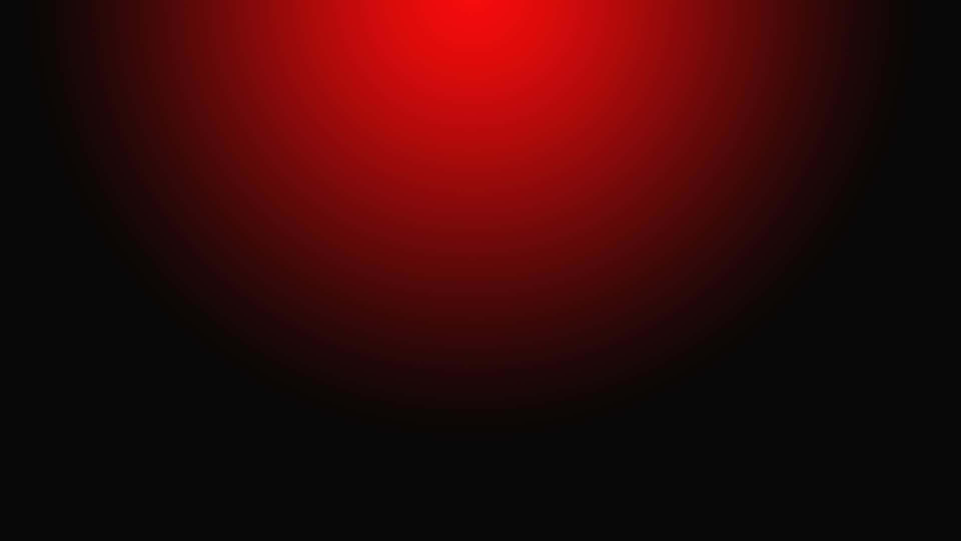 明亮多彩的紅漸層背景 壁紙 — 一個發光的紅色漸變圓圈在深黑色背景上柔和地脈動。
