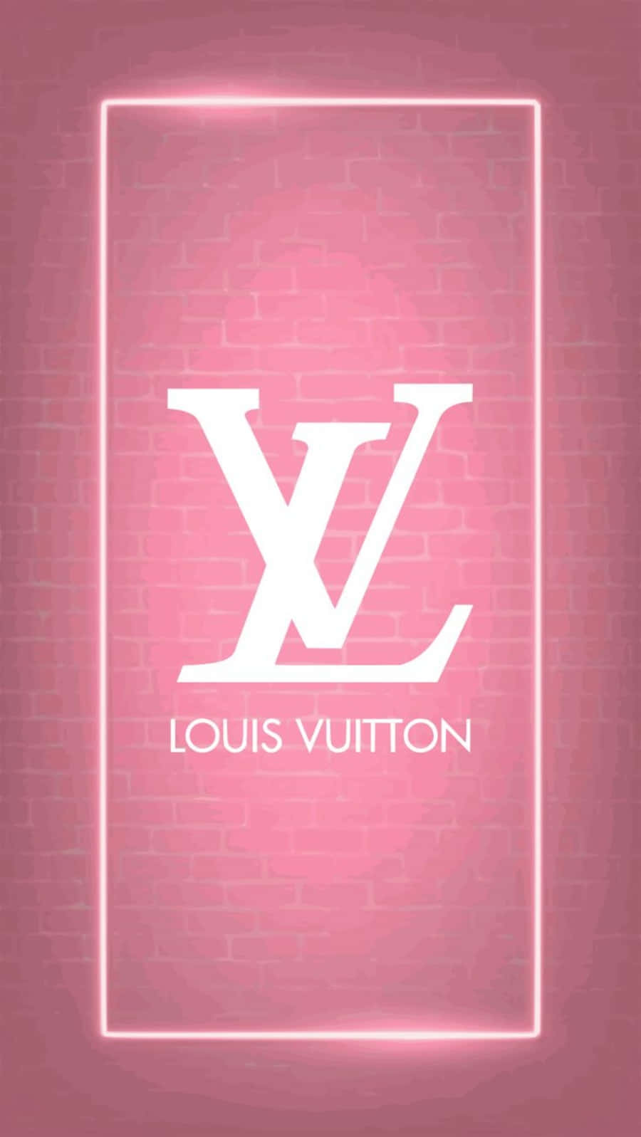Louis Vuitton 標誌在粉紅磚牆上的白色霓虹燈框內。