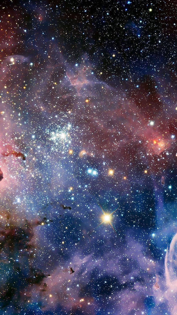 充滿活力的宇宙星雲，在深空中閃爍著星星和旋轉的雲層。