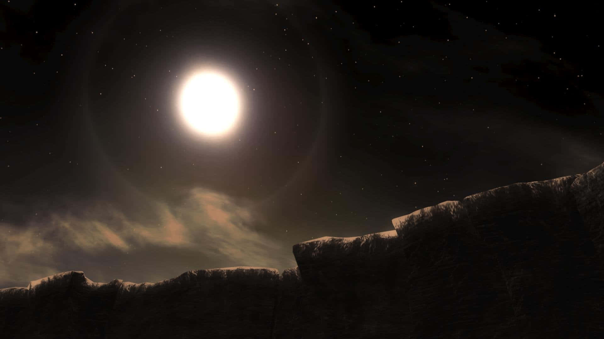 深色主題 桌布 壁紙 — 明亮的月亮在繁星點點的夜空和縷縷雲彩下，為崎嶇的岩石地形投下柔和的光芒。
