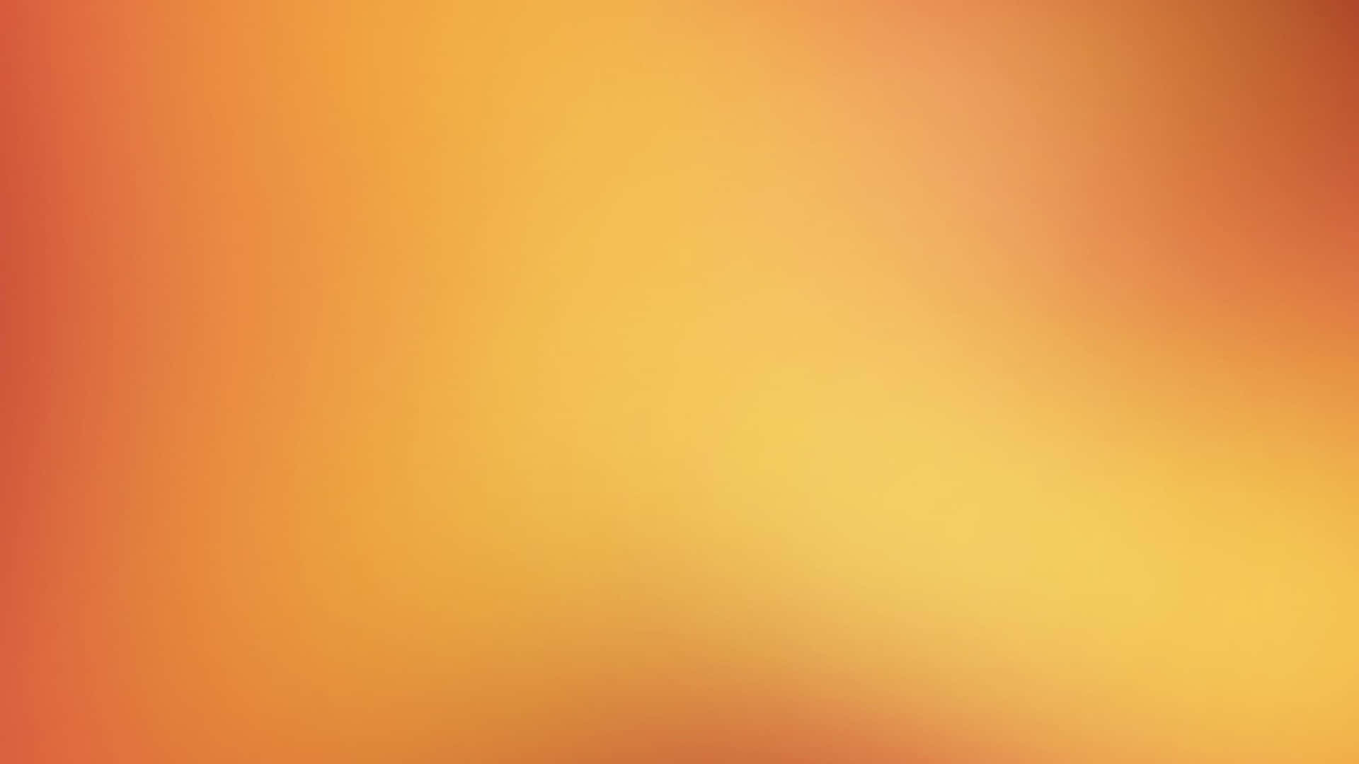 柔和的橙色和黃色色調漸變，營造溫暖的抽象背景。