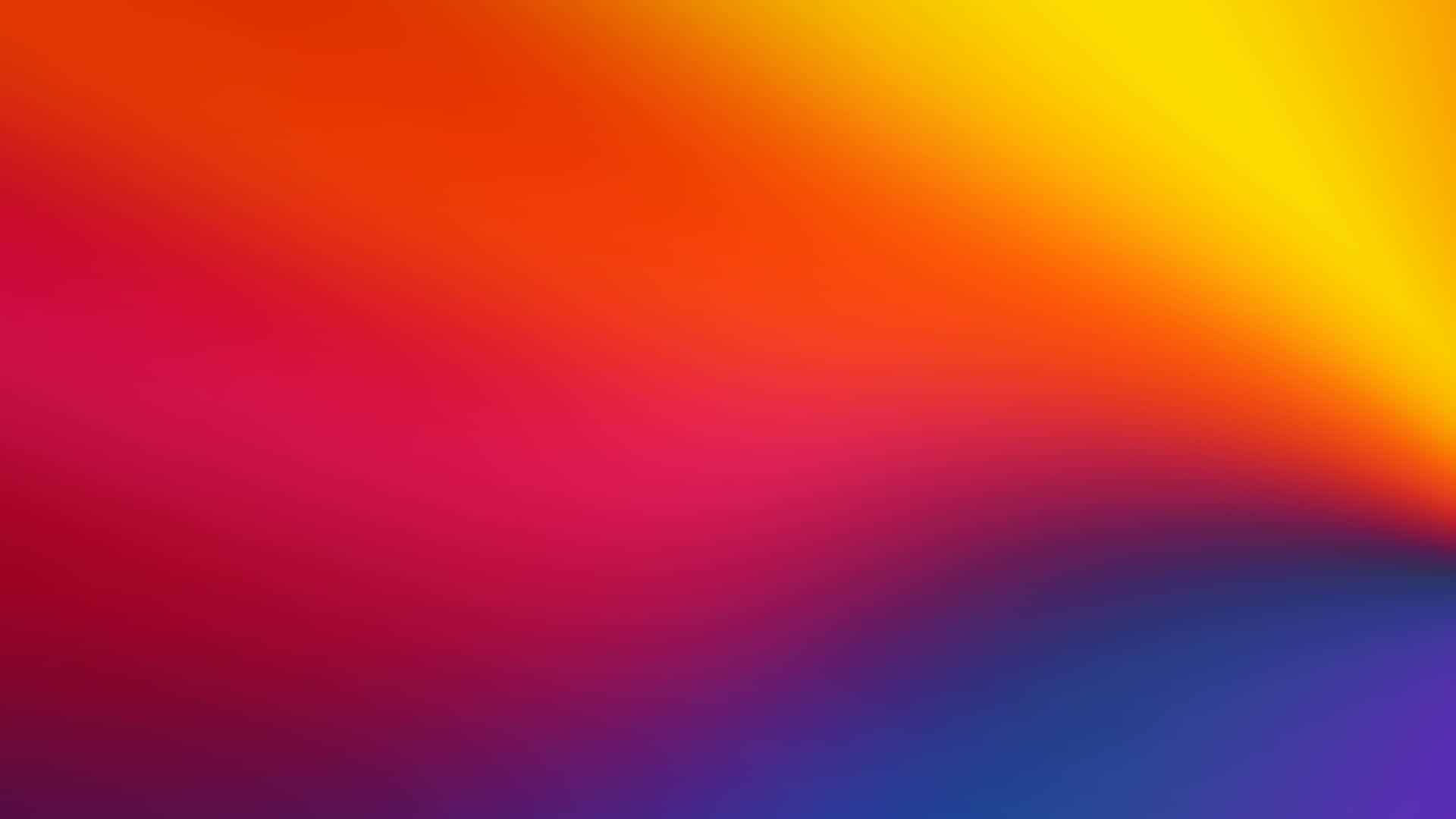 充滿活力的抽象漸變背景，融合橙色、黃色、洋紅色和藍色