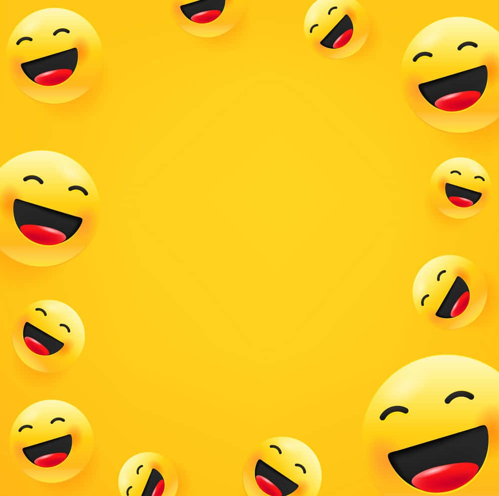 笑緊 桌布 壁紙 — 明亮黃色笑臉表情符號在純黃色背景上圍繞中央空白區域形成歡樂邊框。