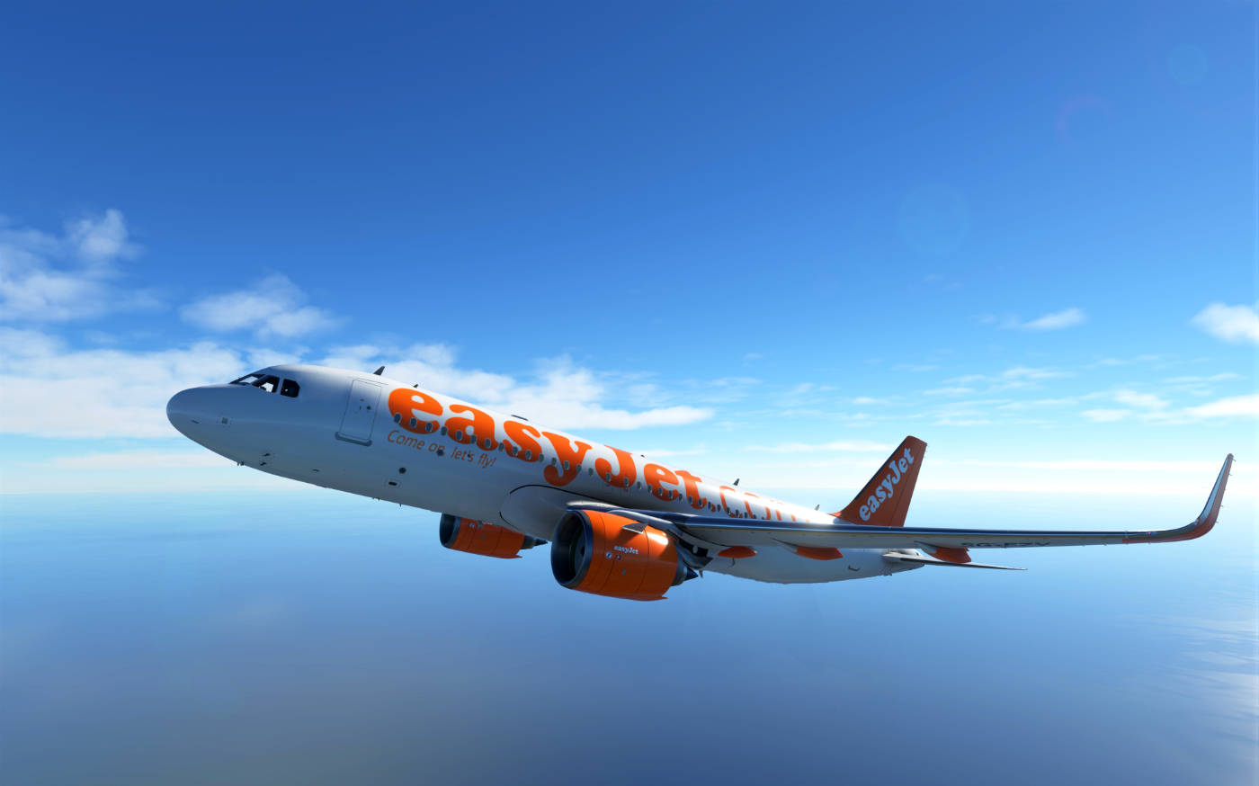 易捷航空飛機在藍天下飛越海洋