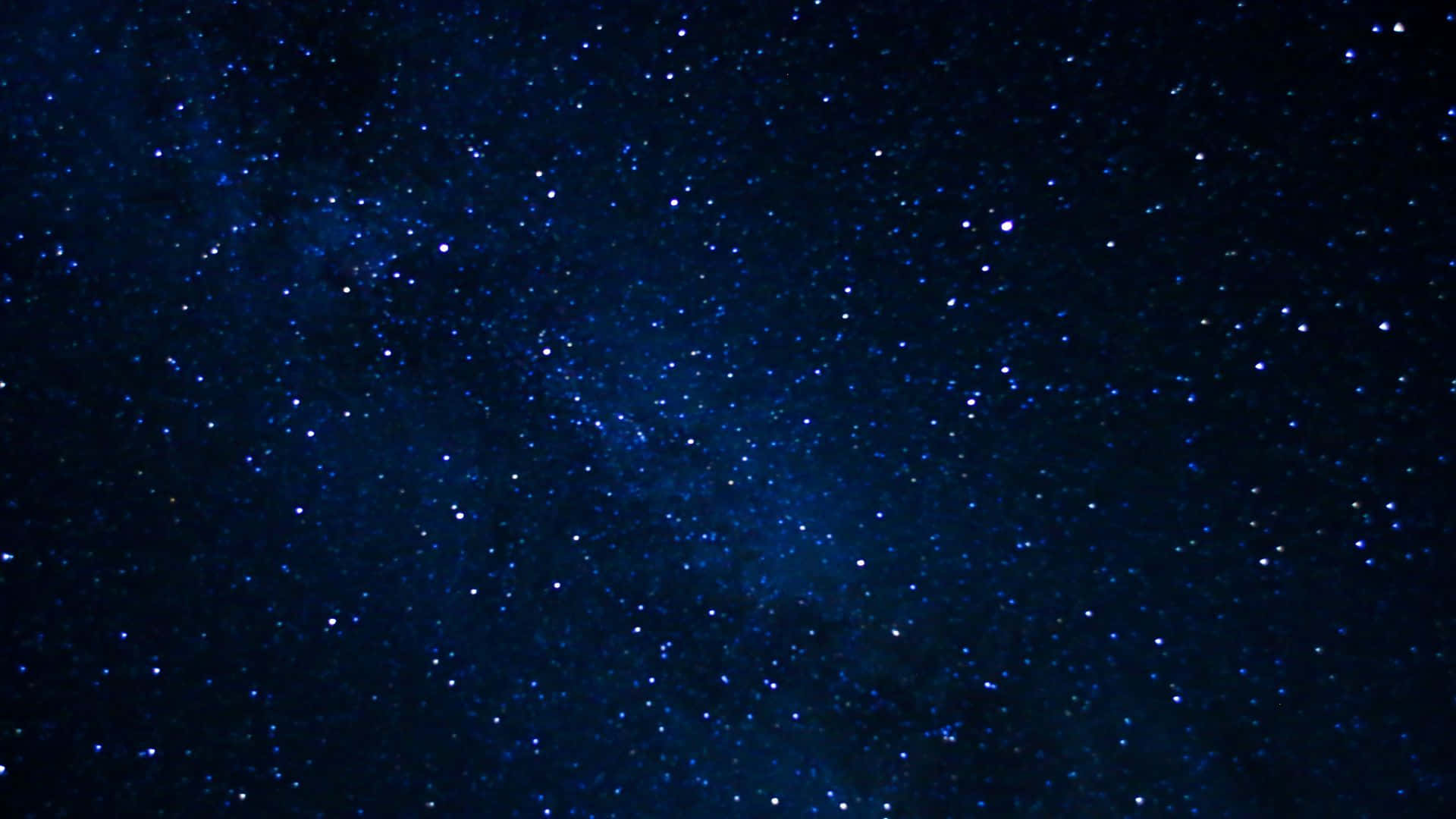 廣闊的星空，有發光的星星和宇宙塵埃雲。