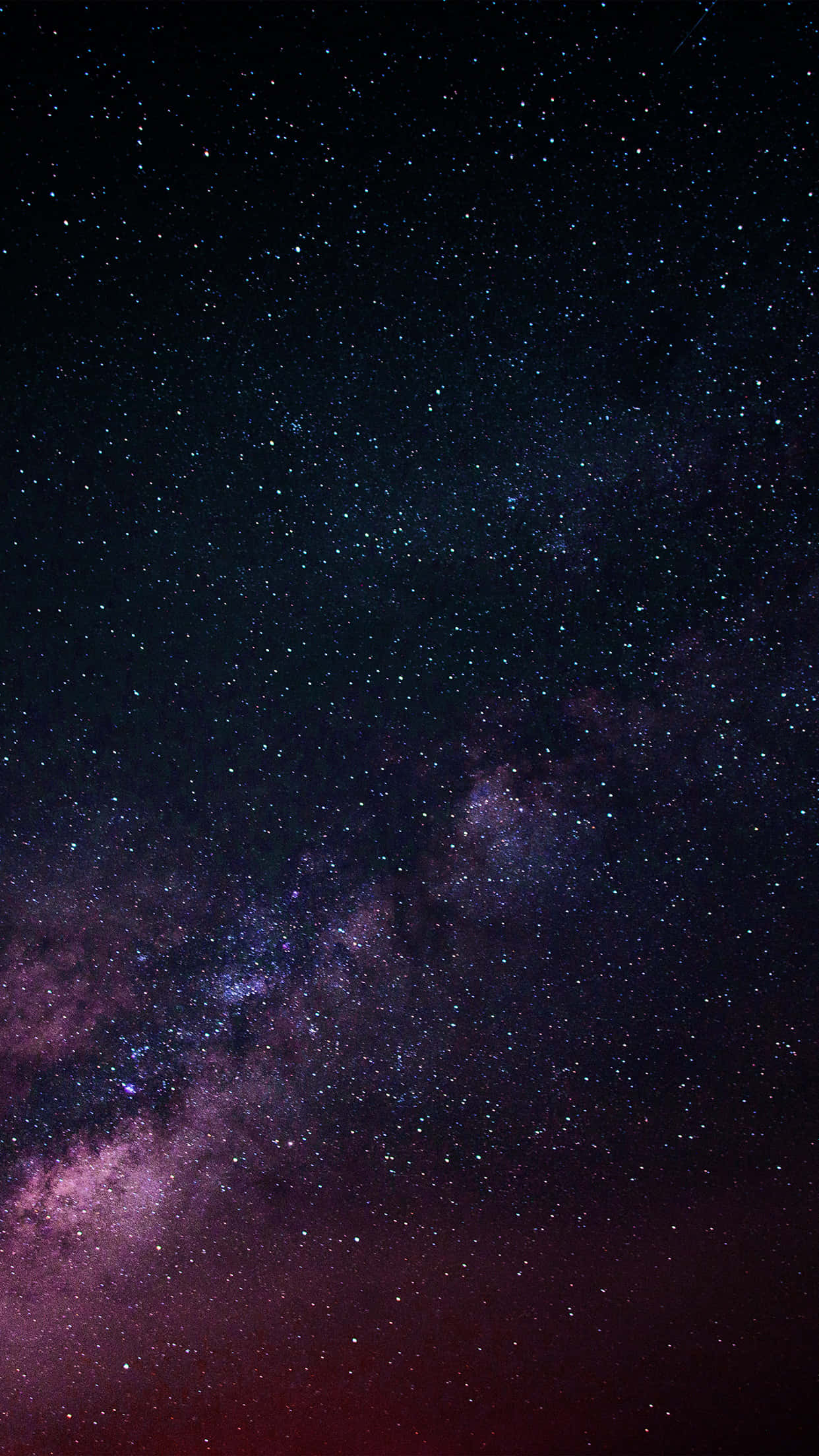 星空背景配氣體星雲 壁紙 — 令人嘆為觀止的銀河系景觀，紫色和粉紅色的星雲在深邃的黑色夜空中閃耀。