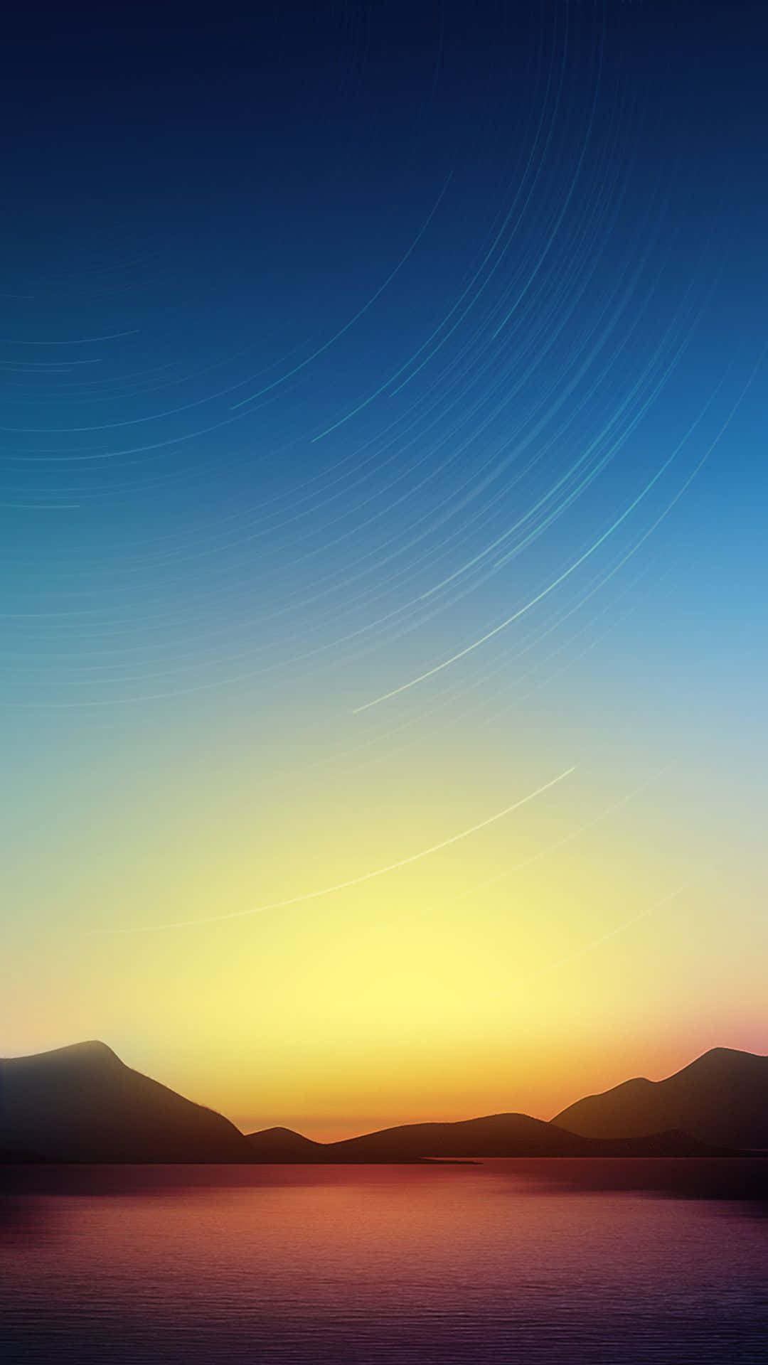 Mobile Phone 桌布 壁紙 — 星軌在暮色天空中劃過弧線，映襯著倒映在平靜水面上的山巒剪影。