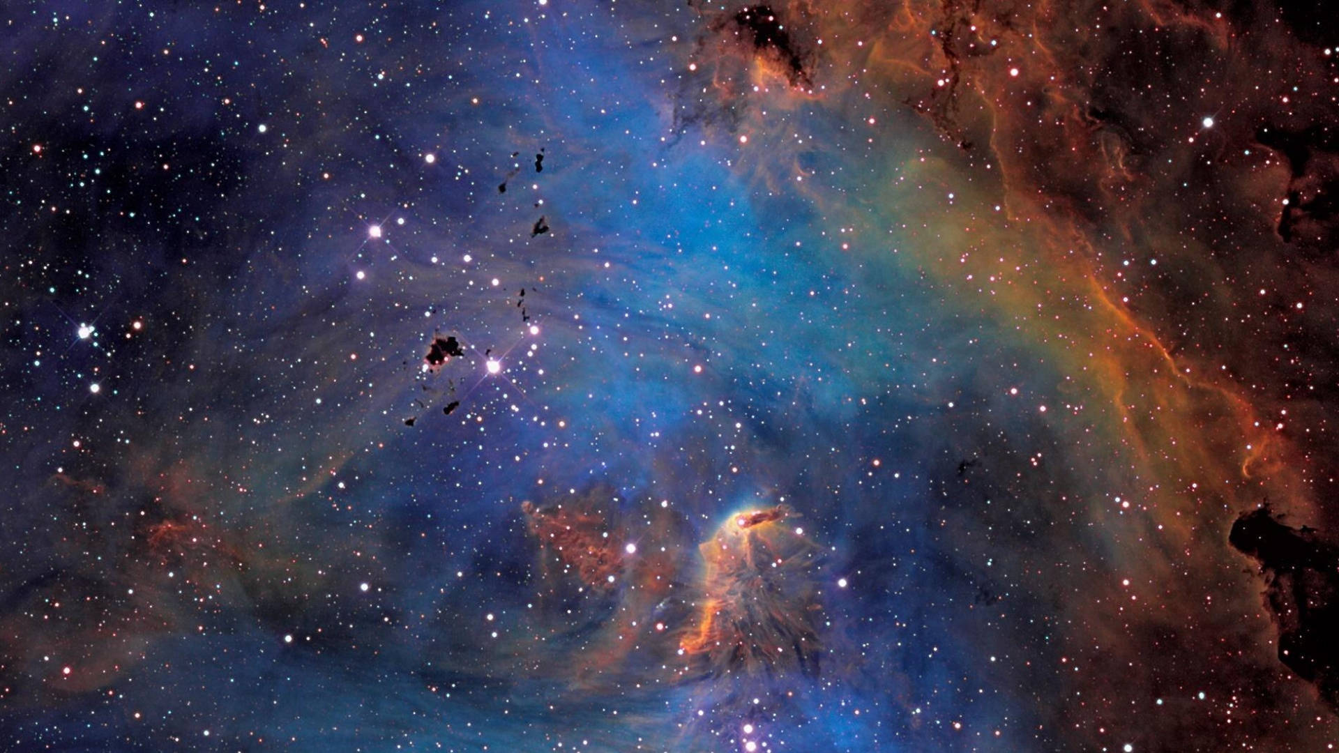 廣闊的宇宙場景，深空中色彩繽紛的星雲和閃爍的星星。