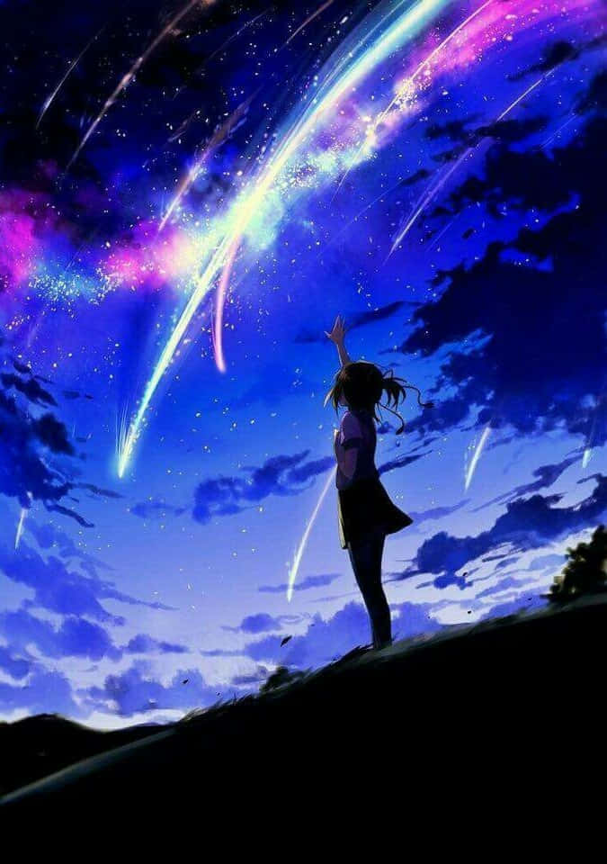 星際動漫彩色流星 壁紙 — 一個孤獨的動漫女孩站在山丘上，向著充滿色彩繽紛流星和閃爍星星的充滿活力的宇宙天空伸出手。
