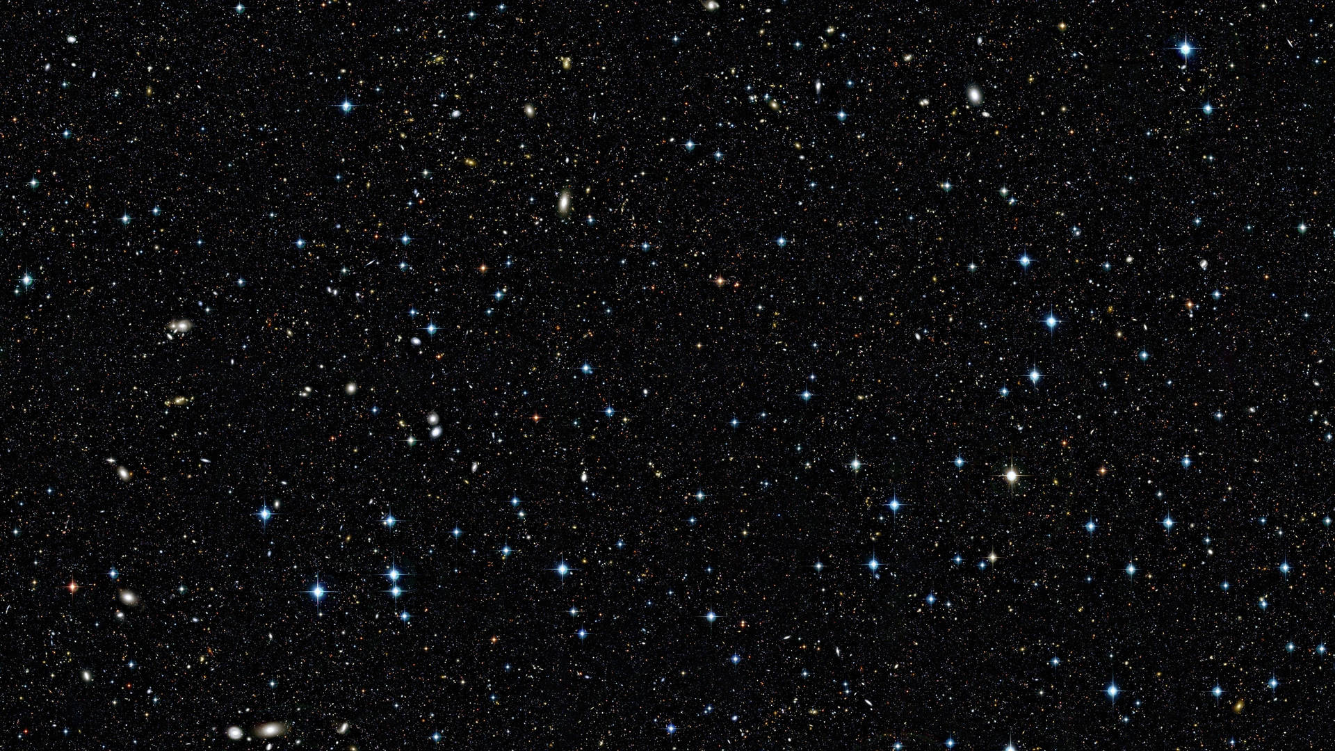 夜空中廣闊的恆星和星系場。