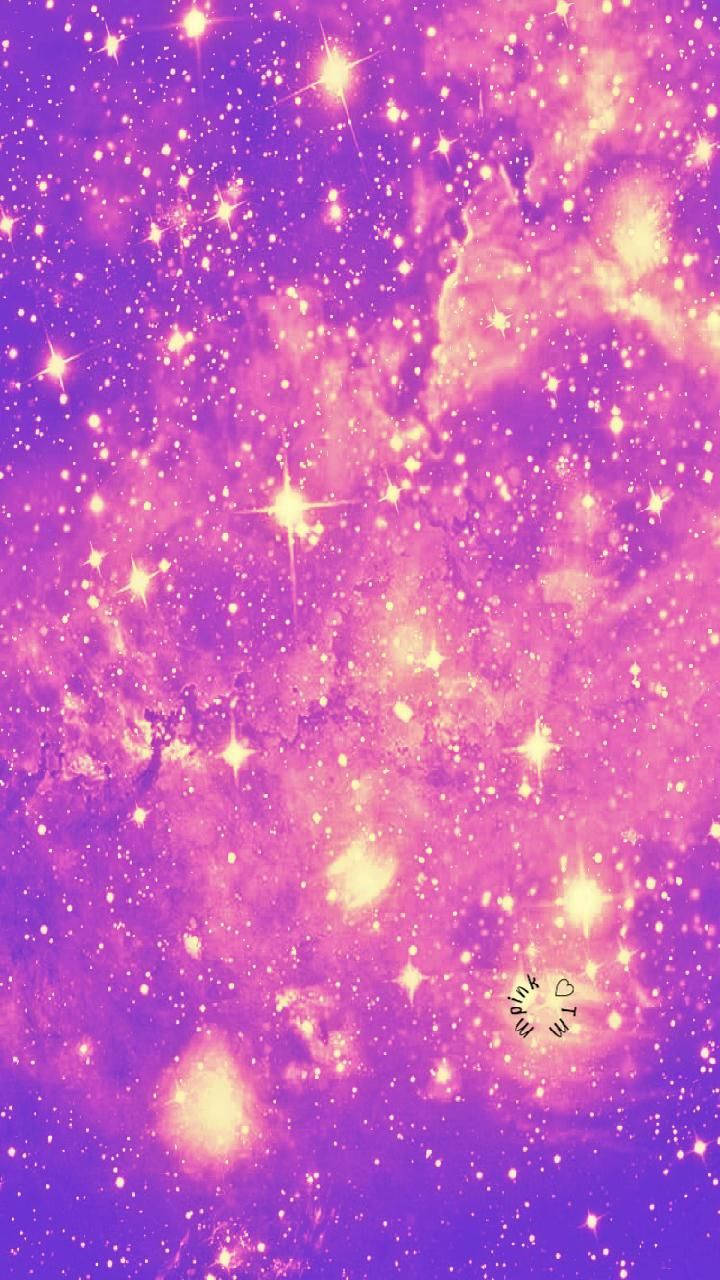 充滿活力的紫色和粉紅色星系，帶有發光的星星和星雲雲。