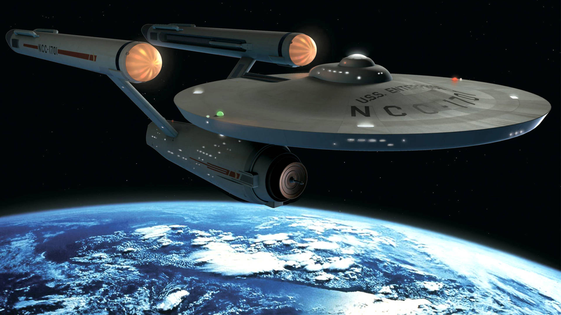 星際迷航星艦 USS Enterprise 飛越地球 壁紙 — USS Enterprise NCC-1701 在藍白相間的行星上方滑翔，背景是星光點點的黑色虛空。
