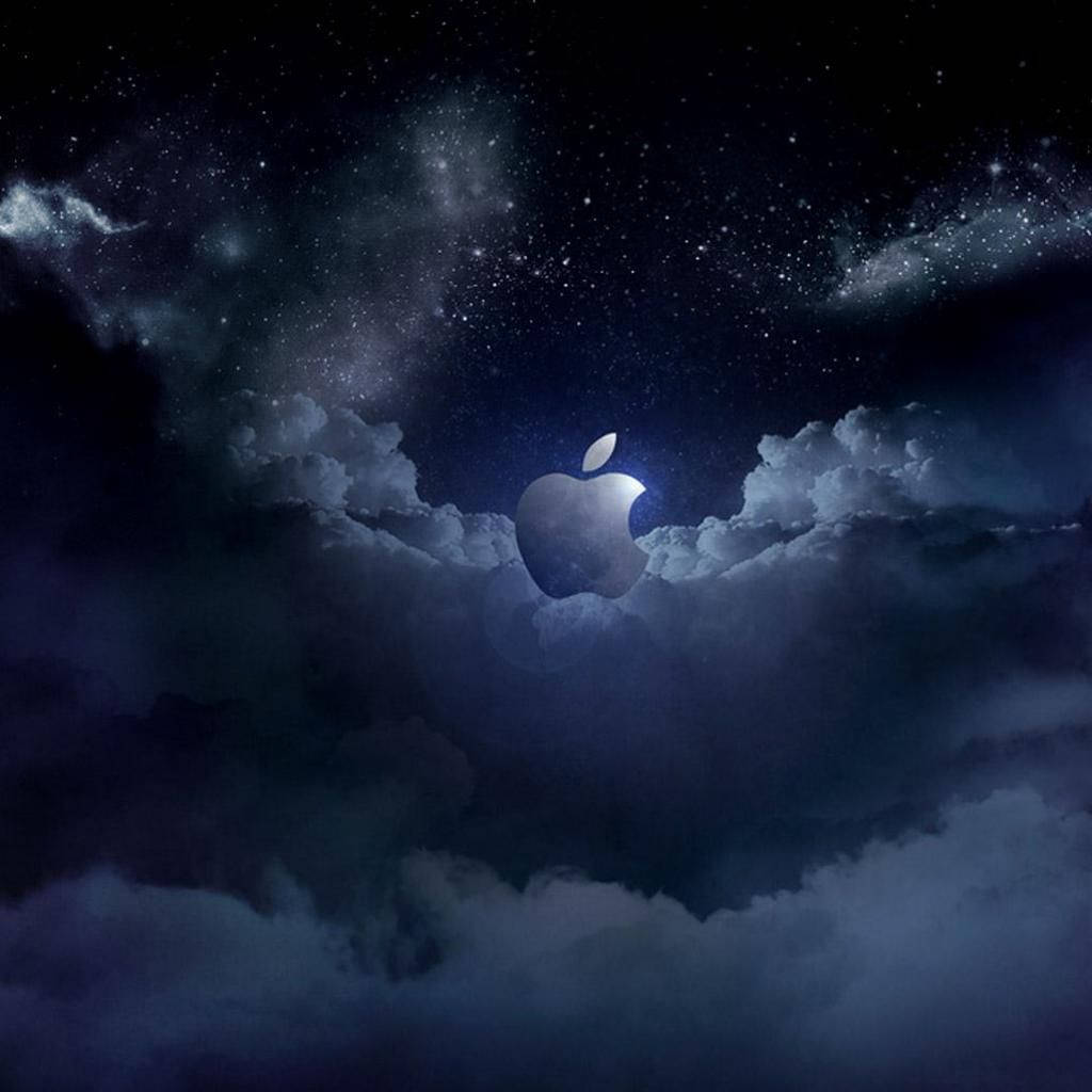 Apple標誌在夜空發光，有星星和雲