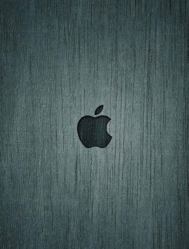 拉絲金屬背景上的黑色Apple標誌