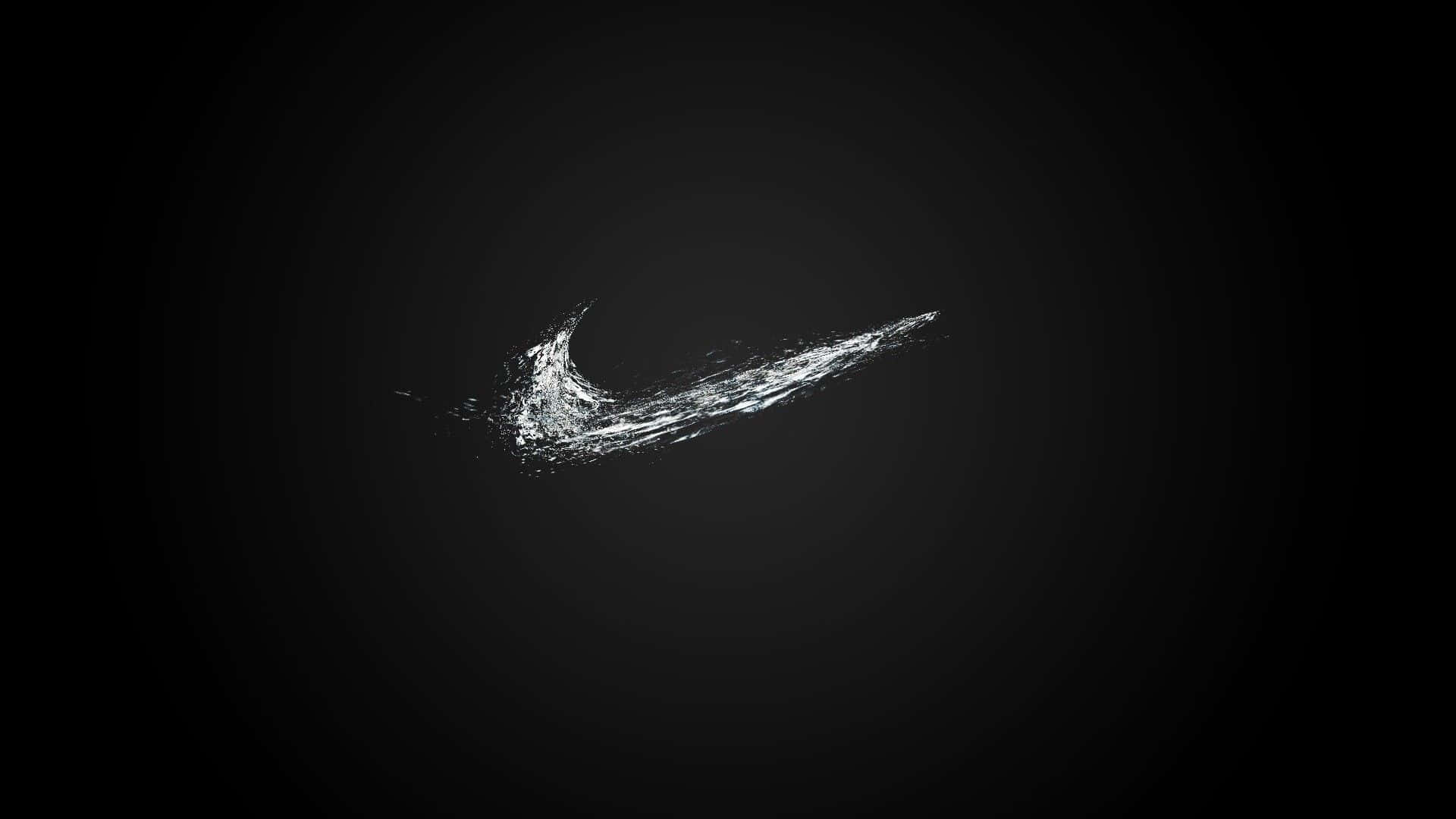 在深色背景上由水滴組成的Nike勾號標誌