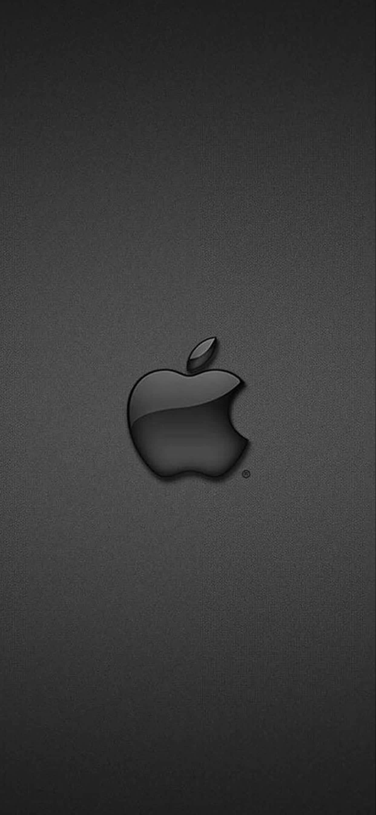 時尚優雅的 Apple iPhone XS Max 壁紙 — 一個時尚的黑色Apple標誌，居中放置在帶有細微漸變照明的紋理深灰色背景上。
