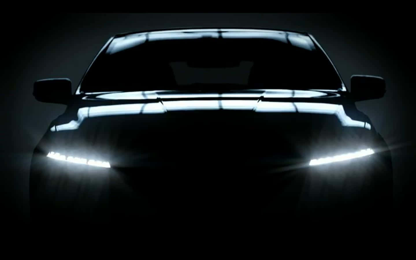 Proton 桌布 壁紙 — 時尚汽車的發光車頭燈在戲劇性的攝影棚拍攝中穿透黑暗。