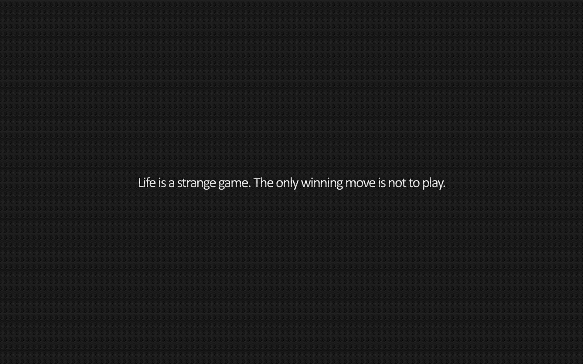 時尚的龐克風格桌面背景 壁紙 — 極簡深色背景，中央白色文字 life is a strange game the only winning move is not to play。