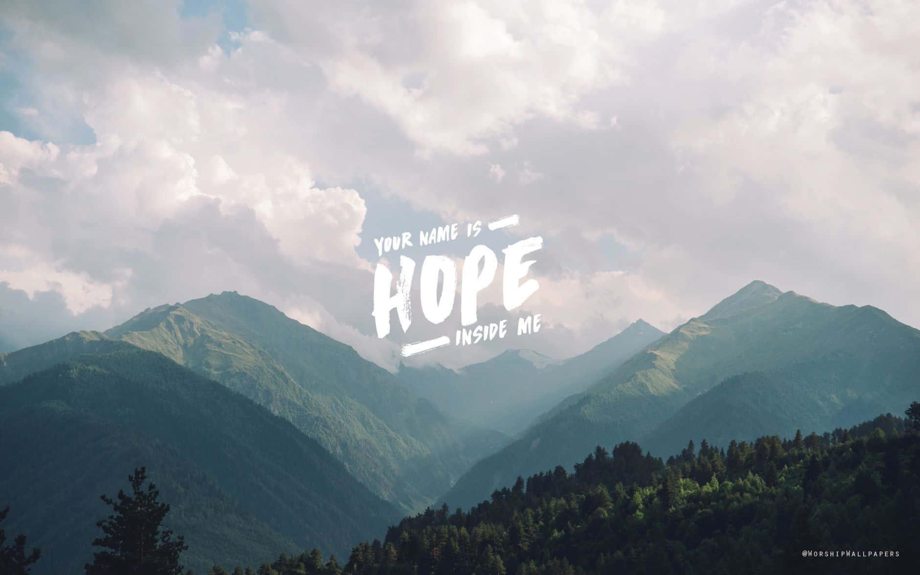 山脈上疊加著勵志文字 'Your name is hope inside me'。