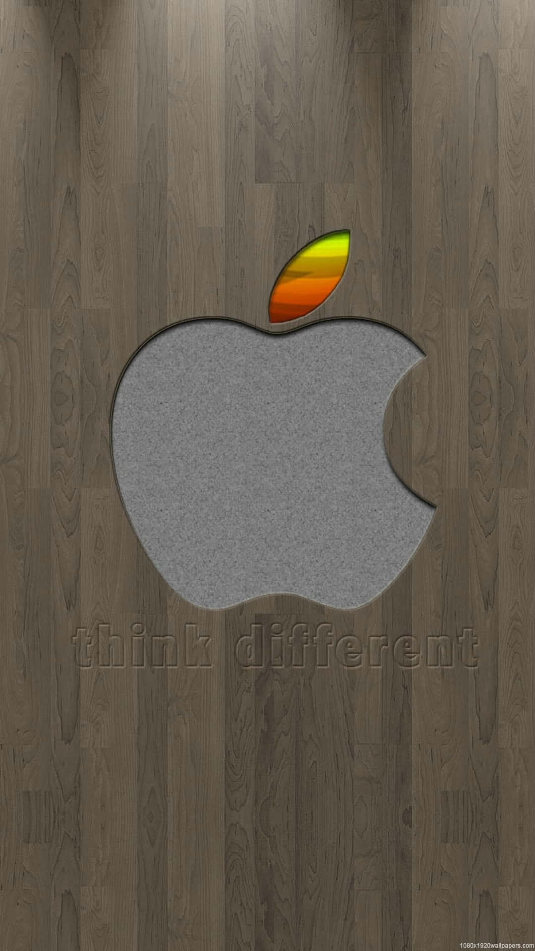 深色木紋背景上的彩虹葉Apple標誌。
