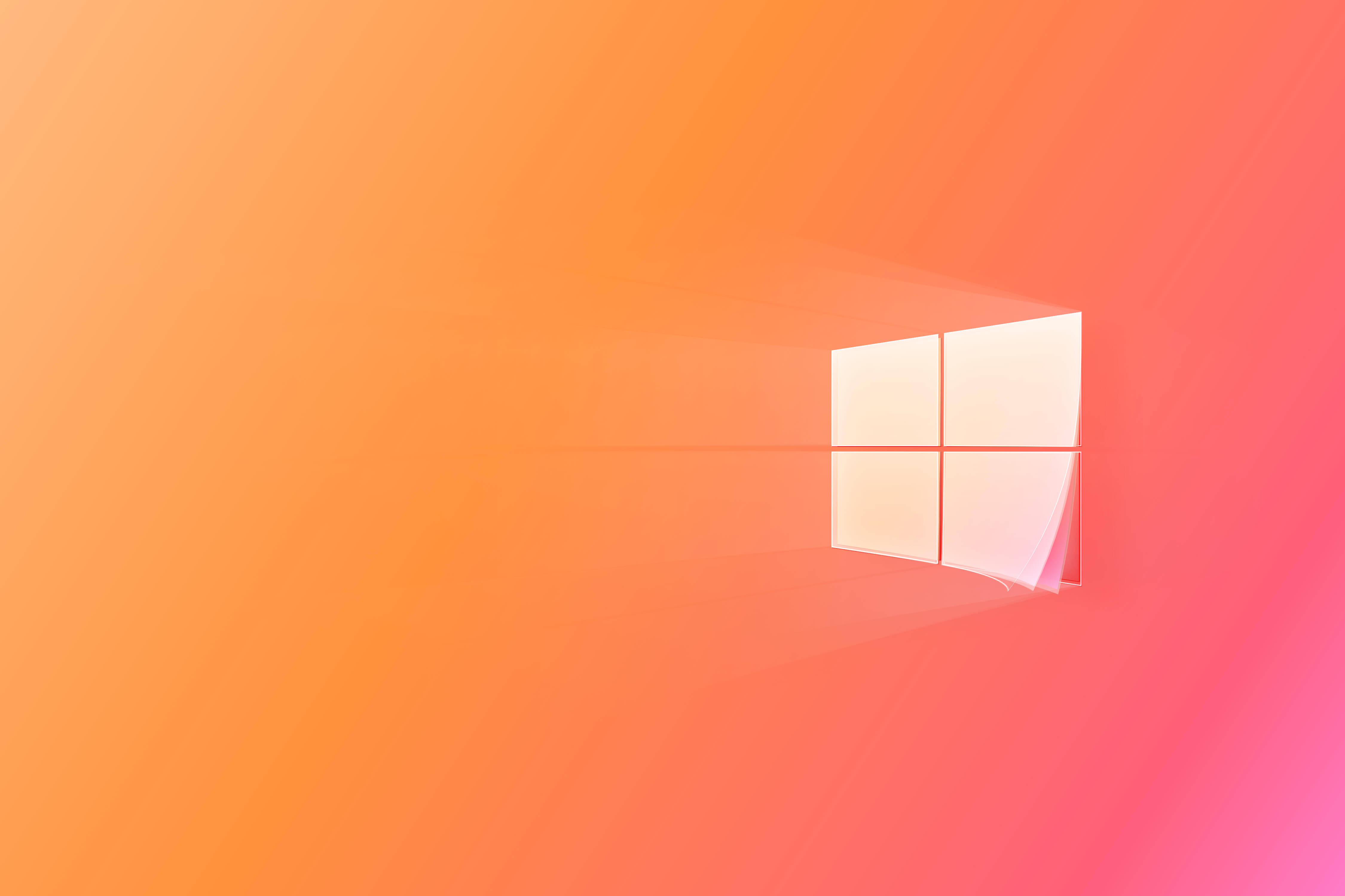 暖色 Windows 10 高清 壁紙 — 發光的Windows標誌漂浮在橙色和粉色的平滑漸變背景上。
