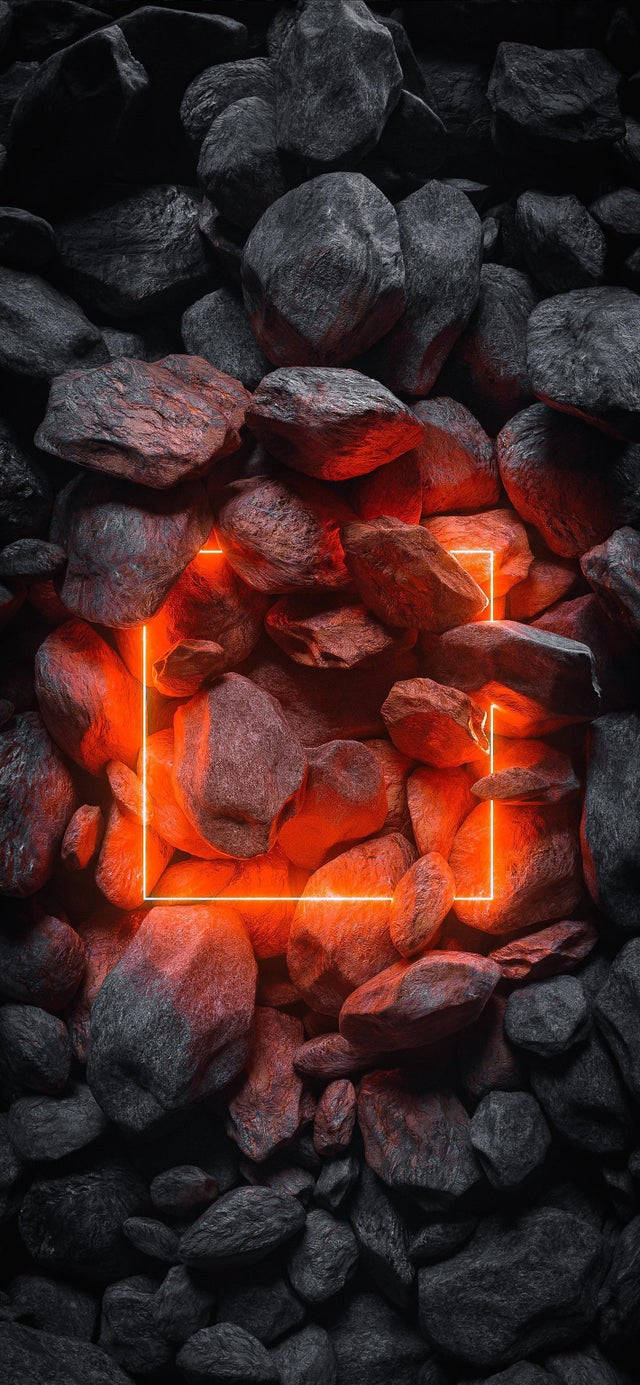 暗紅石頭 iPhone 13 Pro 壁紙 — 一個發光的橙色霓虹框圍繞著深灰色岩石間的熾熱紅炭。