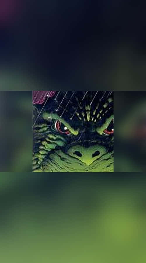 Godzilla Comic 桌布 壁紙 — 暗色調雨中綠色巨龍兇猛面孔的特寫，帶有發光的紅色眼睛。