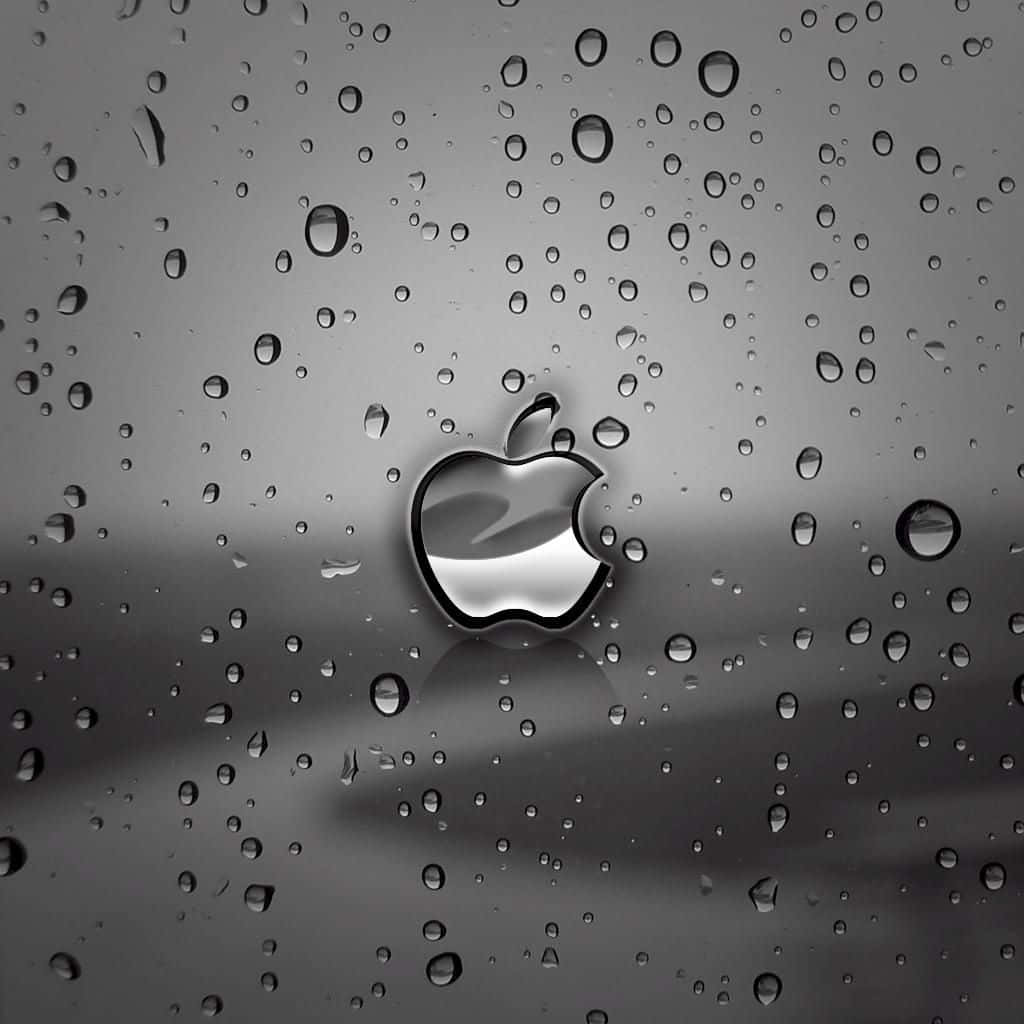 Apple標誌在玻璃上的雨滴中反射