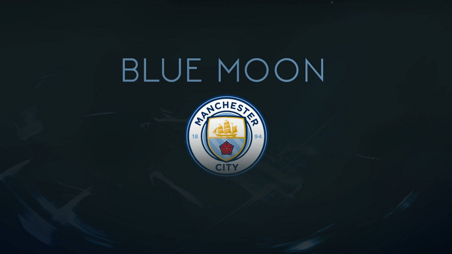 曼徹斯特城足球會標誌，深色背景上帶有「BLUE MOON」文字。