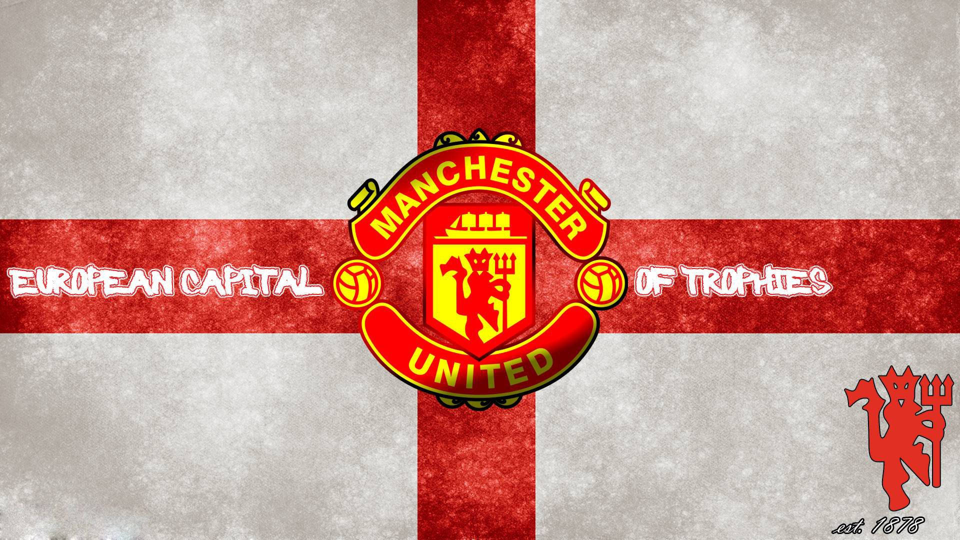 曼聯足球會標誌，紅白十字背景上帶有「European Capital of Trophies」文字。