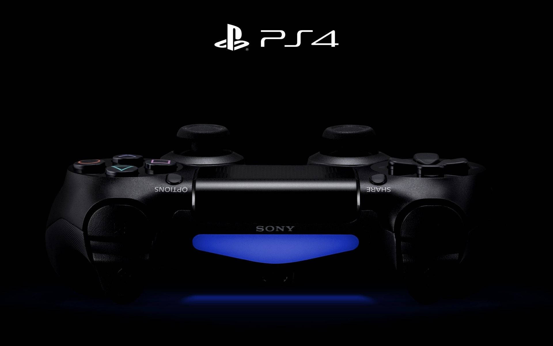 黑色PS4手掣在黑暗背景上發出藍光。